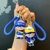 Creative Party Favor Klein blue car keychain cute and delicate boy girl doll couple bag small pendant wholesale