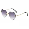 Óculos de sol 2022 marca design em forma de coração sem moldura para mulheres moda vintage tendência senhoras metal gradiente UV400 amor óculos de sol