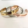 2022 Bracciale cravatta per capelli Braccialetti aperti a forma di C con bordi spazzolati in acciaio inossidabile per gioielli da donna Bracciali per ragazze 3 colori freeshippi