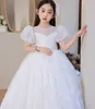 2022 Bling Crystal Flower Girls Abiti per adolescenti Tulle Piano Lunghezza Beach Ball Gown Ragazza Spettacolo Abiti da festa Gonna in tulle Formale Principessa Abbigliamento per bambini