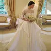 Ballkleid-Hochzeitskleider mit transparentem Ausschnitt, langen, applizierten Ärmeln, Pailletten und Spitze, Brautkleider nach Maß Abiti Da Sposa