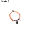 Europe America Fashion Style Armband Men Lady Women Black Metal Hardware graverade V Initialer Lås charm Justerbar Rainbow Polyester Cord Link Armband Q05270