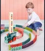 Großhandel Automatische Lege Domino kits Ziegel Zug Auto Set Sound Licht Kinder Bunte Kunststoff Dominosteine Blöcke Spiel Spielzeug für Kinder jungen
