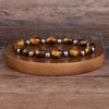 Moda Proteggi i braccialetti per la salute Donna Occhi di tigre naturale Perline di semi di pietra Gioielli Energia Ematite Healing Bracciale Reiki Uomo