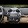 För Volkswagen Beetle 2001 02 03 04 05 06 07 08 09 10 Kolfiber ABS Bil Navigation Kontrollpanelen Luftkonditioneringsuttag