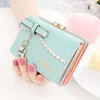 Lady Purse Mooie vrouwelijke korte sectie Japan en Zuid -Korea Nieuwe Cat Mini Pendant Student Small Wallet Metal Zero Wallet