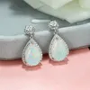 Dingle ljuskrona söt kvinnlig blå vit opal örhängen charm silver färg för kvinnor lyx runda kristallsten bröllop örhängen.