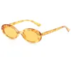 Gafas de sol Oval Retro Gafas de sol Diseñador Moda Marco pequeño Color caramelo Leopardo Anti UV Gafas Verano Protector solar Tonos Anteojos B7954