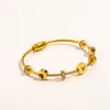 Bracelets de style de mode classiques Femmes Bangle Designer Bijoux Crystal Gold plaqué en acier inoxydable Lovers Gift Bracelet pour hommes