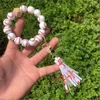 Accessoires de sport en titane nouveau bois bricolage bracelet de perles porte-clés pendentif faveur de fête ballon de sport football baseball basket-ball bracelet de perles en bois 9 couleurs