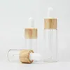cylinder transparent 5ml 10ml 15ml round clear glass oil eye dropper bottle 20ml with wood grain top