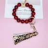 Pulseiras de miçangas de madeira lembrancinhas de festa chaveiro com estampa de leopardo feito à mão pulseira de couro com borla pingente pulseira fashion suporte pulseiras anel de pulso bijuterias B8196