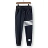 Mens 반바지 여름 디자이너 바지 브라운 모션 팬츠 캐주얼 스포츠 2022 Thom Fashion Quick Drishing Men Beach Pants Black M5XL 1092935