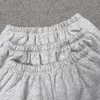 Shorts superposés gris 2022 hommes femmes 1 short imprimé bouffant de haute qualité poches zippées culottes