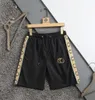 2022 marca designer shorts masculinos grandes calças de praia verão moda rua wear secagem rápida maiô placa impressão M-4XL562265A