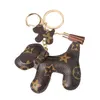 Cute Dog Design Car Keychain Bag Ciondolo Charm Jewelry Flower Portachiavi Holder Donna Uomo Regali Fashion PU Leather Animal Portachiavi Accessori