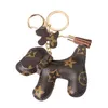 Mignon chien conception voiture porte-clés sac pendentif charme bijoux fleur porte-anneau femmes hommes cadeaux mode PU cuir Animal porte-clés accessoires JRS0