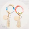 Foreign trade new food grade silicone beads bracelet keychain cotton thread tassel pendant key ring wholesale multi-color optional