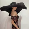 Cappelli da sole pieghevoli a tesa larga da 25 cm per le donne Cappello da sole oversize da donna Cappello da viaggio in paglia Cappello da spiaggia con protezione UV da donna 220525