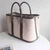 Large capacity new canvas with cowhide head bag garden party casual hand one-shoulder miaoqibags color slant tote