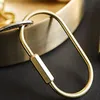 سلاسل المفاتيح 1pc brass keychain portable فريدة من نوعها DIY Craft Tools Whistle raber key Ring Ring Exclseories Pendant Jewelry