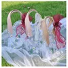 Sacchetto regalo in PVC sacca trasparente per matrimoni trasparente borse souvenir carine eleganti imballaggi di ritorno con impugnatura da fiore chic