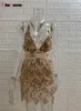 Niglub SparkleバックレスタッセルスパンコールBODYCON DRES DEEP Vネックローブ包帯チャールスマパーティードレス誕生日服220402