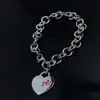 Cadena de plata Pulseras de corazón Joyería de diseño Gota de aceite Pulsera de amor rojo para mujeres Hombres Collares pendientes Boda Heanpok 22050602R