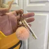 12 Cores Ful Fur Pom Pom Pom Chaves Soft Faux Fur Ball Car Key Ring Women Bolsa Bolsa Pingente Pingente Chaços Charms Presentes