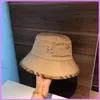 Ny Bucket Hat Kvinnor Lyx Sommar Mode Fritid Designer Casquette Mens Caps Hats Kvinnor Keps Avancerad känsla Full av Enkel Nice G223175F