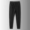 Men's Pants Spring Summer Men's Pure Black Small Feet Casual Korean Style Stretch Harem Loose Sports Oversized Streetwear M-8XLMen's Dra