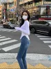 2022 sommer Heiße Mädchen Neue Koreanische Sexy Große Loch Zeigen Dünne Vielseitig Elastische Enge Höhe Taille Kleine Fuß Jeans Frauen flut L220726