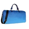 2023 Hot Designer 50 cm duża pojemność worki podróżne ogólne przeznaczenie damskie męskie płótno skórzane płótno Paski na ramię bagażowe Zbudne litery V Bag Duffel Bag Messenger 096