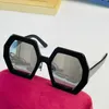 Occhiali da sole da uomo e da donna in stile caldo popolare 0772S Design unico della montatura Senso della moda Foto di viaggio super vacanza di alta qualità con scatola originale