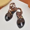 Designerinnen Frauen Sandalen gleiten modische flache Strandschuh -Sandalen -Flip -Flop -Leinwand einfache Gladiatorenschuhe Schuhe