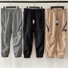 Tide Brand CP Pants CP Spring and Autumn's Sports's Sports Leisure Travel Nylon Pantaloni a violazione a bordo sgradevole per esterni da jogging esterno sciolti pantaloni in pietra 237