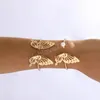 Mode minimalism metall ihålig fjärilsarmband med justerbar öppning för kvinnor hiphop asymmetriska armband smycken