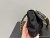 Ny säsong mini nylon vadderade axelpåsar mode mini-messenger väska damkedja klaffväska med läder trim lyxiga kvinnor crossbody designer handväska storlek 16 cm*13cm