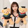 Leuke Dr. Bear Gevulde speelgoed Kawaii Small Teddy Bear Plush Doll Children's Soothing Pillow Student Graduation cadeau