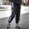 Pantaloni cargo Hip Hop Uomo Streetwear Casual Pantaloni da jogging elastici in vita Pantaloni da uomo Pantaloni sportivi Pantaloni colorblock Harajuku Harem Pants 201128