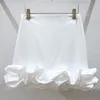 Nova moda coreana feminina cor sólida cintura alta bonito drapeado curto mini saia pétala plus size smlxl
