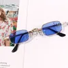 20 piezas / set Gafas de sol Gafas de sol de ojo de gato retro europeas y americanas gafas de sol escultura de arena gafas de rebote foto pareja triángulo gafas de sol redondas