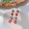 Dangle Chandelier New Korean Hyperbole Vintage Rainbow Crystal Rhinestone Purple Love Heart Long Drop Boucles d'oreilles pour les femmes Bijoux de mariage