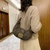 20% KORTING 2022 hoge kwaliteit nieuwe mode trendy tassen club zadel veelzijdig oksel Single Shoulder Messenger Canvas dames