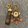 Designer Animal Key Chain Brown Flower Monkey Tiger Lion Bear Keecheins Accessori PU Leather Keys Holder Cartone Gold Metal 5861219