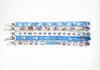 Precio de fábrica 100 piezas Doraemon Anime Lanyard Keychain Correa de cuello Cámara ID de cámara Pense Party Fiesta Accesorios de regalos Al por mayor