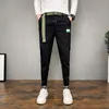 calças claras verdes