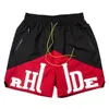 Sommermenschen Damen Rhude Shorts Mode Casual Leathier Knie Länge Lose Skateboard Hip Hop Schwimmhosen Strand Rhude Taschenqualität Reißverschluss Kurz Asien Größe S-XL