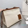 Designer -capaciteit winkelzakken temperament vrouwen handtassen canvas geometrische schouderbagss mode bakken lange schouderband hoge kwaliteit