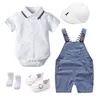 新生児の男の子の夏の赤ん坊の服セット綿の子供の誕生日のドレス白い幼児服帽子ロンパー全体の靴ソックス5個